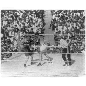  Jack Dempsey Gibbons boxing match; Dempsey landing left 