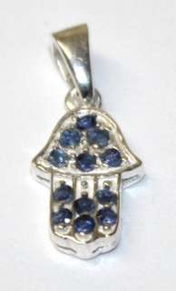 This amulet magnet includes a Hamsa, an ancient symbol picturing an 