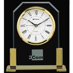   clock with roman numerals and beveled glass panel.