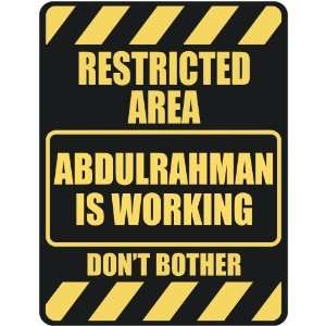   RESTRICTED AREA ABDULRAHMAN IS WORKING  PARKING SIGN 