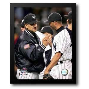 Joe Torre & Mariano Rivera congradulate each other after defeating Red 