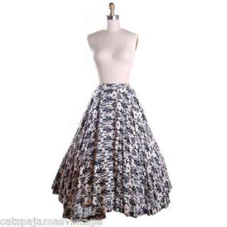 Swirly perfect circle skirt of loosely woven linen with a black and 