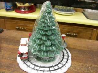 CANDLE CHRISTMAS TREE ON A CERAMIC BASE WITH 3 PIECES OF A TRAIN 