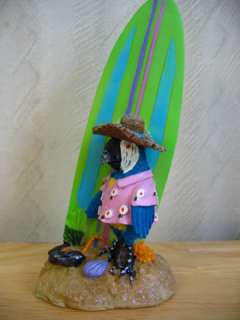 Decorate your home with this eye catching parrot and surfboard 