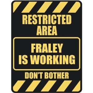   RESTRICTED AREA FRALEY IS WORKING  PARKING SIGN