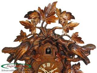 Up for auction genuine hand made Black Forest cuckoo clock. New 