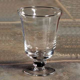 This stemmed flared top votive candle holder works well around the 