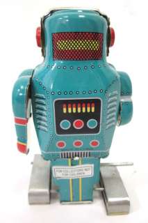   bidding on a VINTAGE SPARK ROBOT Tin Teal Spark Wind Up Robot IN BOX