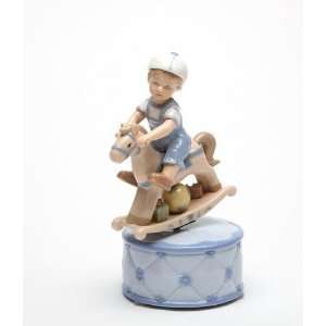  7.125 inch Boy Riding Rocking Horse On Blue Box Ceramic 