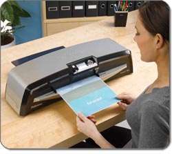 Belt drive system guides documents through the laminator for jam free 