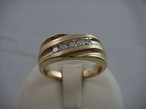 14 K. MENS DIAMOND WEDDING BAND WITH SOLID BACK  