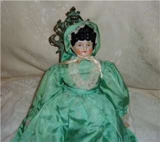 VINTAGE CHINA DOLL # 5 WITH HAND MADE CLOTHES  