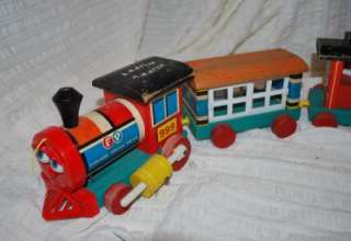 This is a VERY OLD Fisher Price HUFFY PUFFY TRAIN pull toy dated 1963 