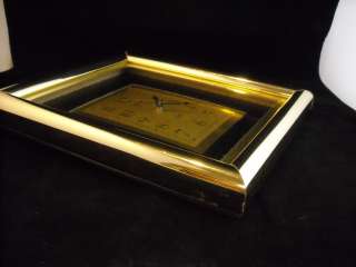 wall clocks w gold plastic frames Citizen Cannon  