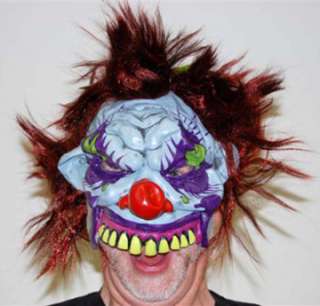 Demented clown half mask, wearers lower mouth is open, fly away hair 