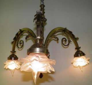 elegant antique bronze chandelier with three beautiful glass shades 