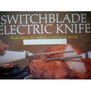  Electric Knife    Blade rotates for vertical or horizontal carving 