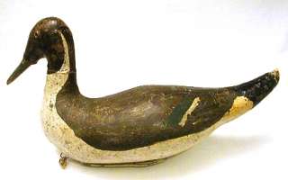 Pair of vintage painted canvas over cork duck decoys. Circa 1920s?