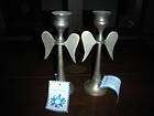 Two metal wall mount candle holders  