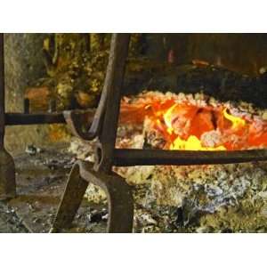  Fireplace with a Burning Log, Truffiere De La Bergerie 
