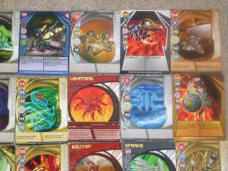Lot of 10 Bakugan and 24 cards, One battle gear     