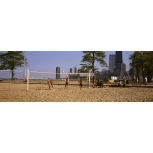Group of People Playing Beach Volleyball, Chicago, Illinois, USA by 